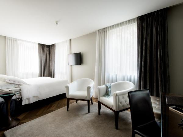 LUGANODANTE - We like you : photo 6 de la chambre chambre double ou lits jumeaux premium avec climatisation