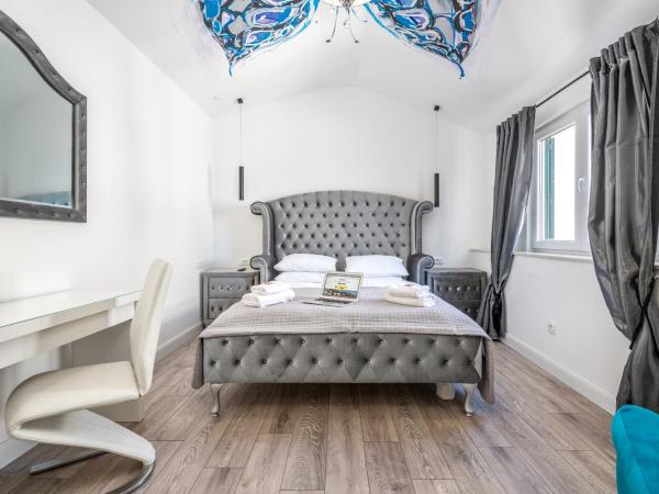 Galeria Valeria Seaside Downtown - MAG Quaint & Elegant Boutique Hotels : photo 4 de la chambre chambre deluxe - vue partielle sur mer et promenade