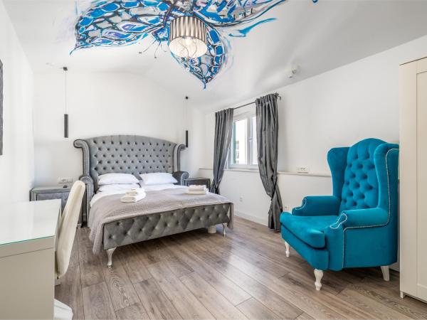 Galeria Valeria Seaside Downtown - MAG Quaint & Elegant Boutique Hotels : photo 8 de la chambre chambre deluxe - vue partielle sur mer et promenade