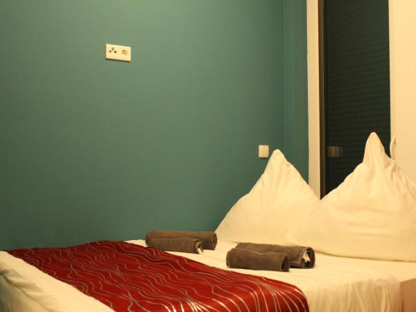 Lovely Studio Cologne West - Neues Momomotel : photo 8 de la chambre chambre double Économique