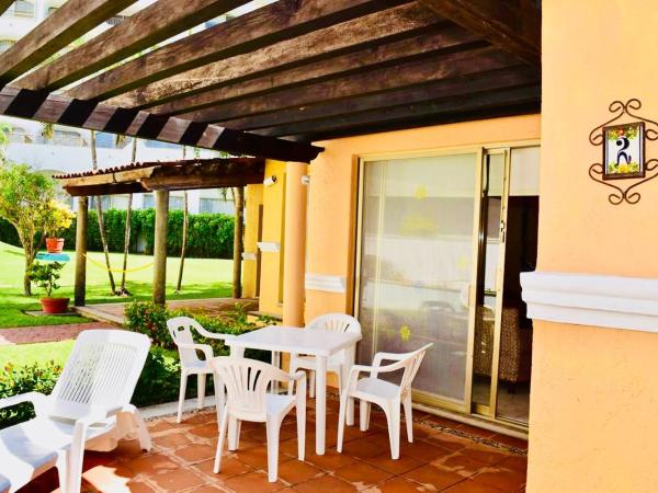 VILLA PARA 5 Personas 4 adultos y 1 Menor En HOTEL TSORO IXTAPA WIFI GRATIS : photo 7 de la chambre chambre quadruple - vue sur jardin