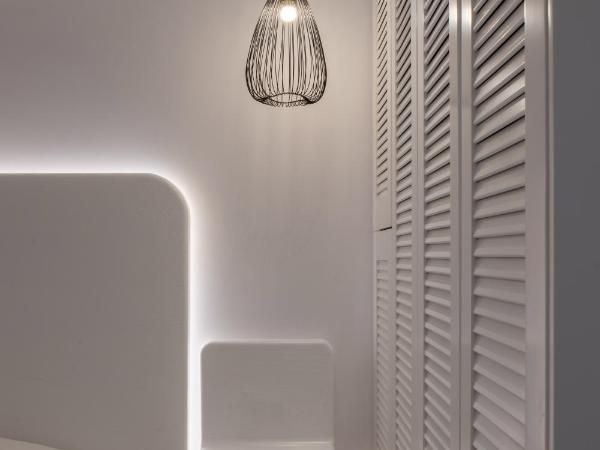 Aeolos Resort : photo 10 de la chambre aile lumière du jour - suite supérieure avec vue sur jardin