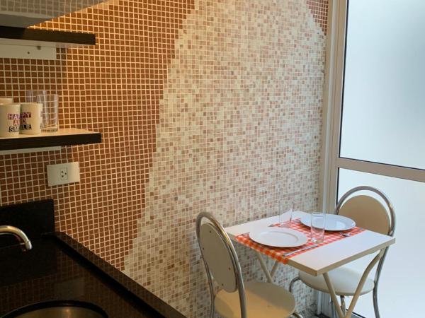 Vila Stellino Suítes : photo 3 de la chambre chambre quadruple avec salle de bains