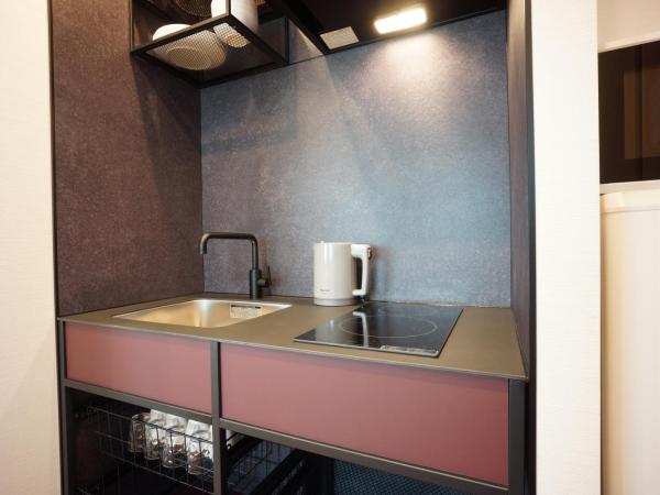 WIRES HOTEL James zaka : photo 6 de la chambre chambre quadruple