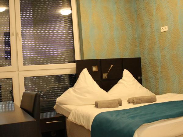 Lovely Studio Cologne West - Neues Momomotel : photo 5 de la chambre chambre double