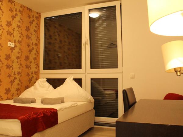 Lovely Studio Cologne West - Neues Momomotel : photo 4 de la chambre chambre double