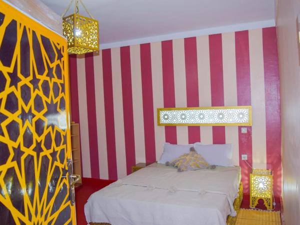 Riad Darga Rouge : photo 4 de la chambre chambre deluxe (2 adultes + 1 enfant)