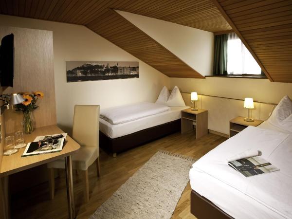 HartlWirt Gasthof-Hotel : photo 1 de la chambre chambre lits jumeaux