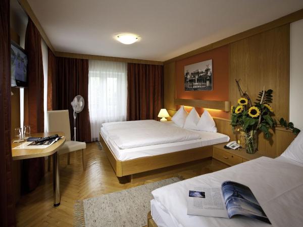HartlWirt Gasthof-Hotel : photo 2 de la chambre chambre triple