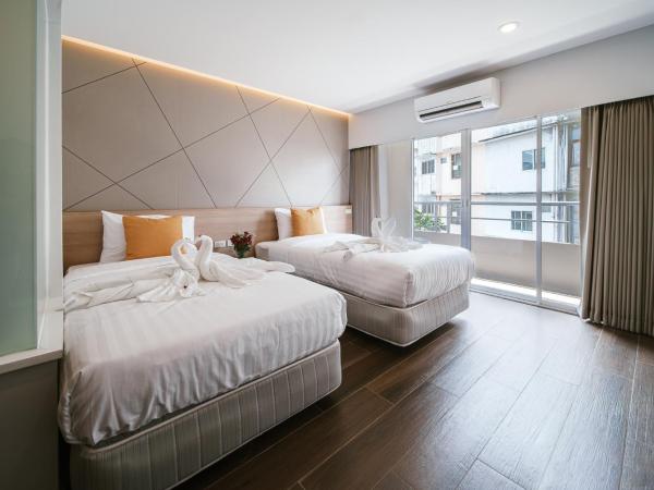 Season Place : photo 6 de la chambre chambre lits jumeaux