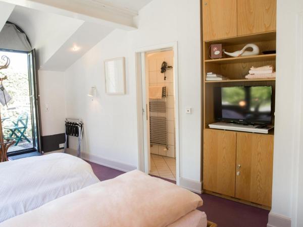 Air Boardinghouse Tulip Stockum, zu Fuß - 3 Minuten zur Messe : photo 6 de la chambre chambre double ou lits jumeaux