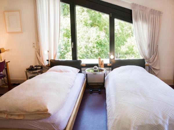 Air Boardinghouse Tulip Stockum, zu Fuß - 3 Minuten zur Messe : photo 7 de la chambre chambre double ou lits jumeaux