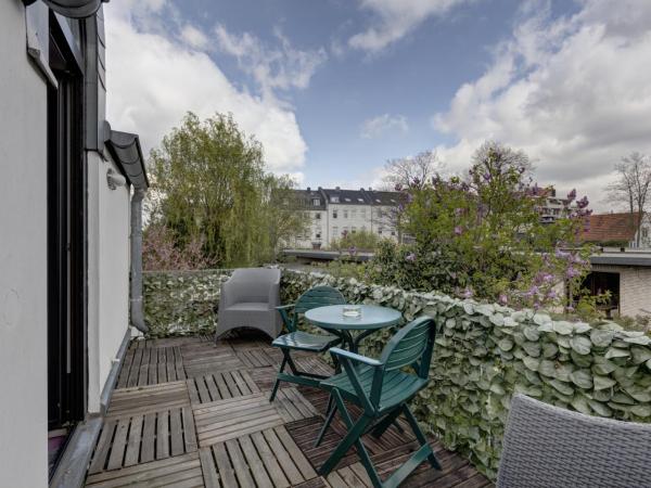 Air Boardinghouse Tulip Stockum, zu Fuß - 3 Minuten zur Messe : photo 1 de la chambre chambre double ou lits jumeaux