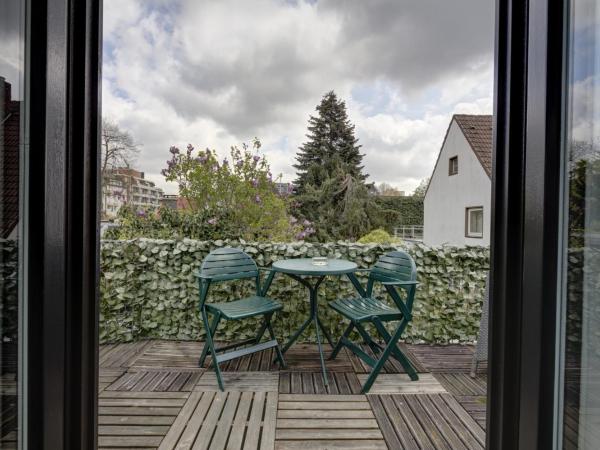 Air Boardinghouse Tulip Stockum, zu Fuß - 3 Minuten zur Messe : photo 2 de la chambre chambre double ou lits jumeaux