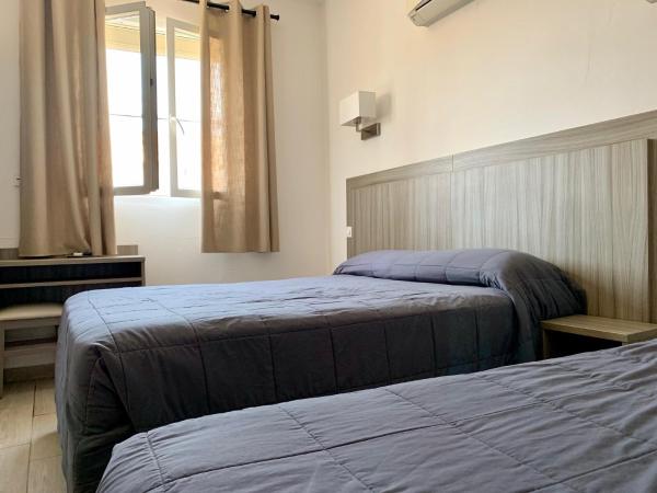 Hotel Les Palmiers En Camargue : photo 3 de la chambre chambre triple standard