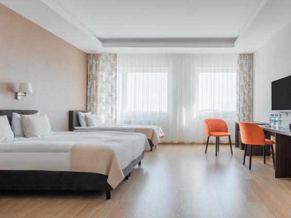 Green Loft Gdynia : photo 1 de la chambre premium apartment with city view (3 adults)