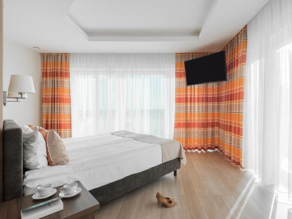 Green Loft Gdynia : photo 1 de la chambre premium apartment with terrace and city view (2 adults)