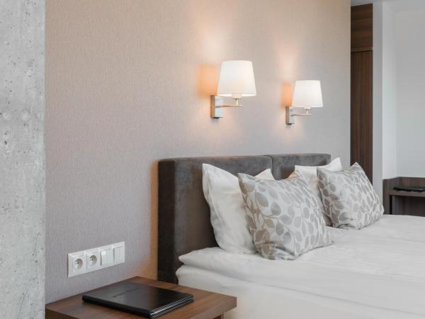 Green Loft Gdynia : photo 5 de la chambre premium apartment with city view (2 adults)