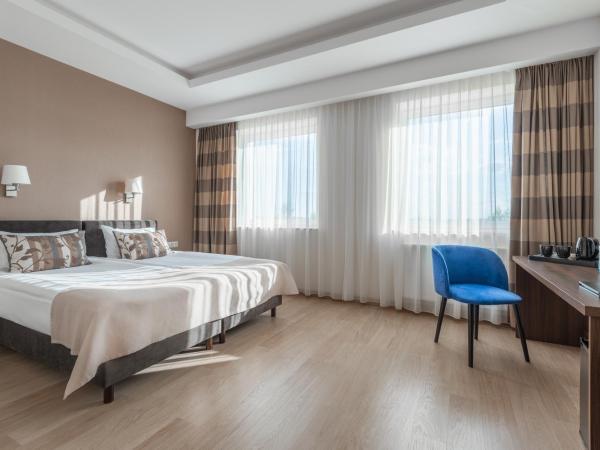 Green Loft Gdynia : photo 1 de la chambre premium apartment with city view (2 adults)