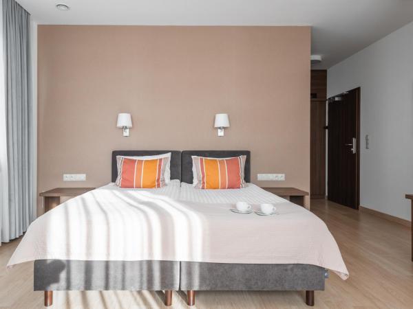 Green Loft Gdynia : photo 8 de la chambre premium apartment with city view (2 adults)