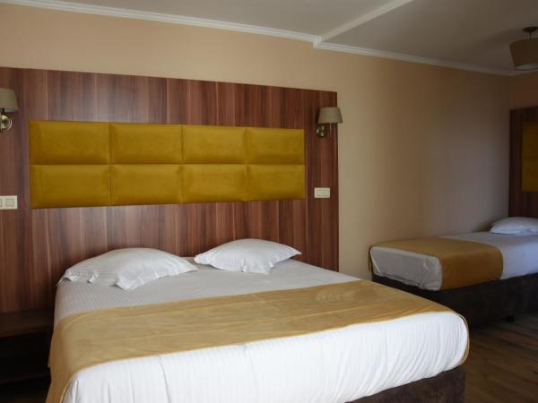 Sun Hotel : photo 1 de la chambre chambre triple confort