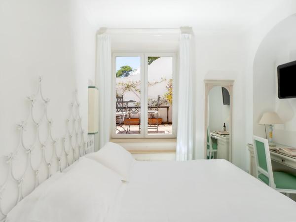 Sina Flora : photo 2 de la chambre chambre lit queen-size