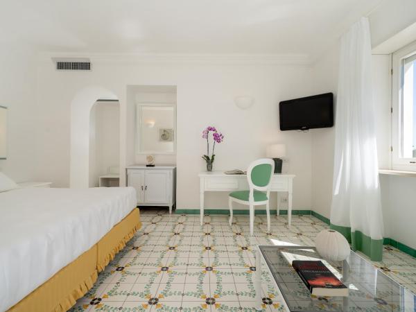 Sina Flora : photo 5 de la chambre chambre lit queen-size