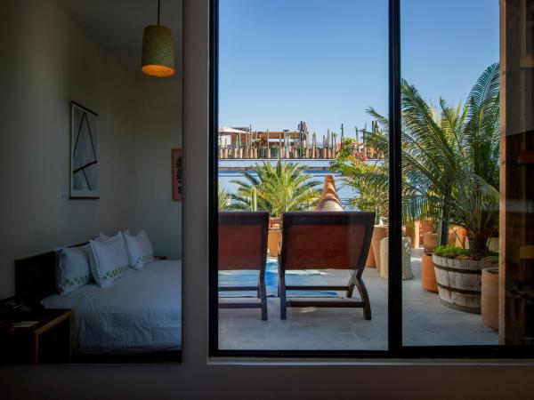 Hotel Los Amantes : photo 3 de la chambre chambre lit queen-size avec balcon