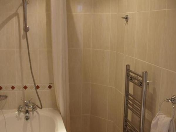 The Beach Hotel : photo 1 de la chambre chambre triple