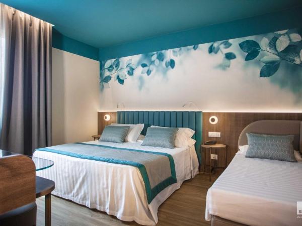 Hotel Regina Elena 57 & Oro Bianco SPA : photo 9 de la chambre chambre lit queen-size deluxe