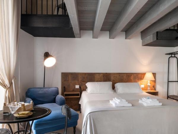 Palazzo Sant'Anna Lecce : photo 2 de la chambre suite lit king-size avec baignoire spa