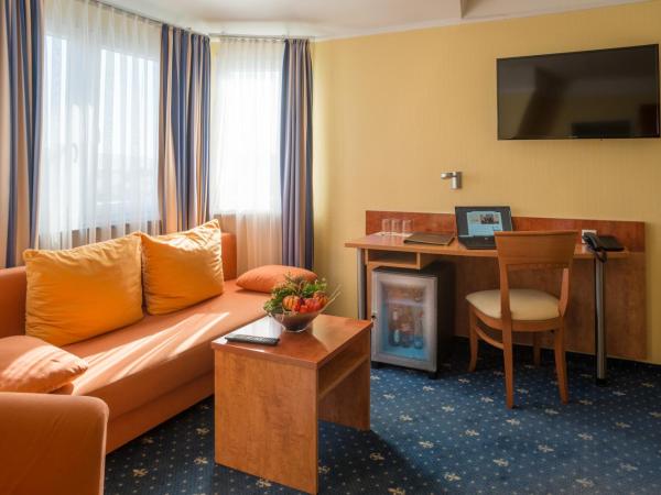Aparthotel Astro - Nichtraucherhotel : photo 1 de la chambre chambre quadruple