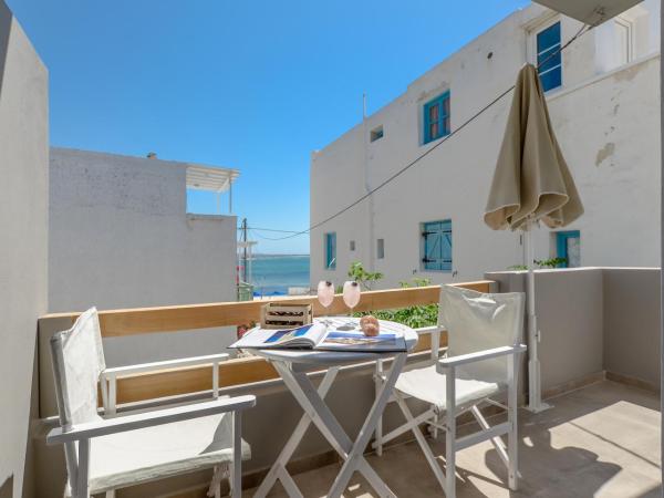 Panormos Hotel and Studios : photo 1 de la chambre chambre lits jumeaux deluxe - vue sur mer