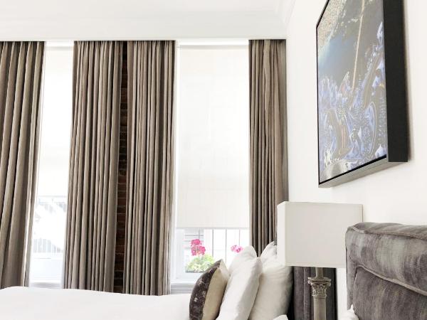 Victorian Hotel : photo 1 de la chambre hébergement 2 lits doubles supérieur (salle de bains privative)