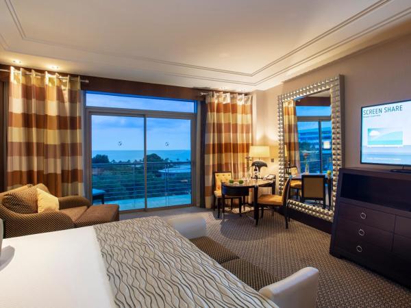 Calista Luxury Resort : photo 2 de la chambre chambre double ou lits jumeaux - vue latérale sur mer