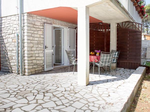 B&B Baron Gautsch : photo 1 de la chambre chambre quadruple avec terrasse