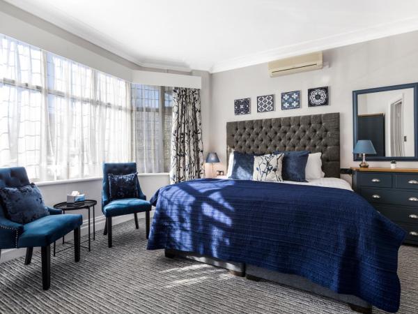 Martel Guest House : photo 1 de la chambre chambre lit king-size