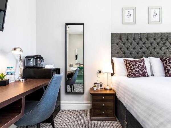 Martel Guest House : photo 2 de la chambre chambre lit king-size