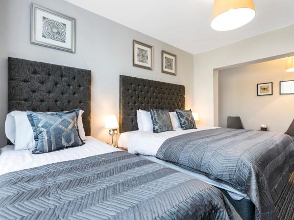 Martel Guest House : photo 2 de la chambre chambre quadruple