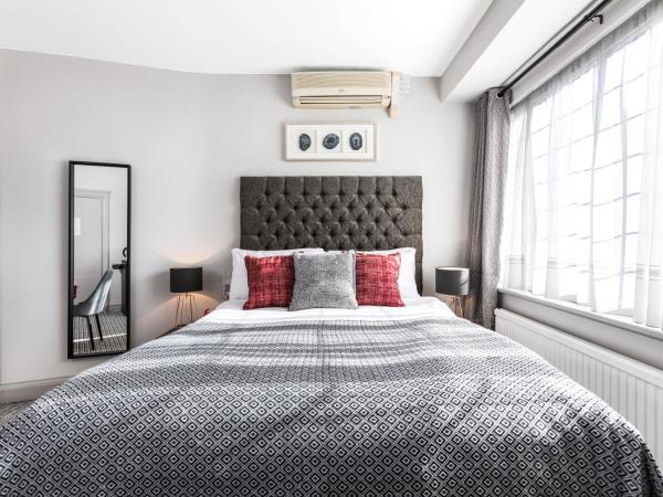 Martel Guest House : photo 4 de la chambre chambre lit king-size