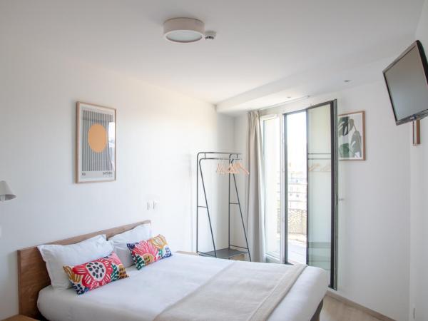 The People - Paris Bercy : photo 2 de la chambre chambre double ou lits jumeaux confort avec balcon