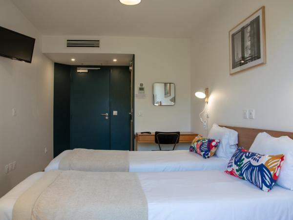 The People - Paris Bercy : photo 1 de la chambre chambre double ou lits jumeaux confort avec balcon