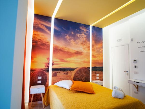 L' Angolo dei poeti - Bed and Breakfast : photo 2 de la chambre chambre double ou lits jumeaux avec salle de bains privative