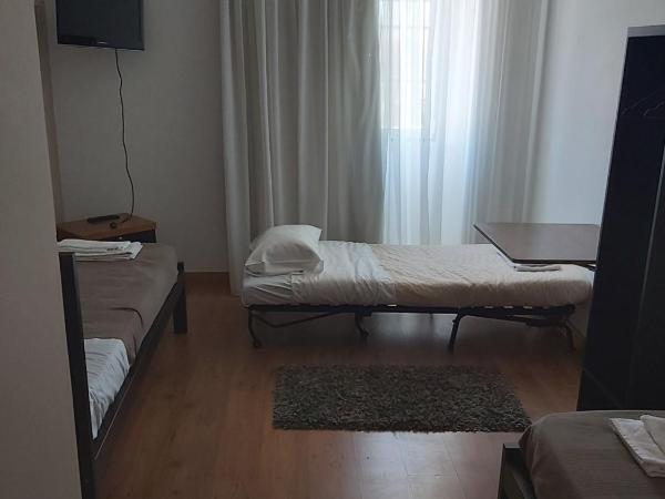 Areia Da Foz : photo 2 de la chambre chambre triple avec salle de bains privative