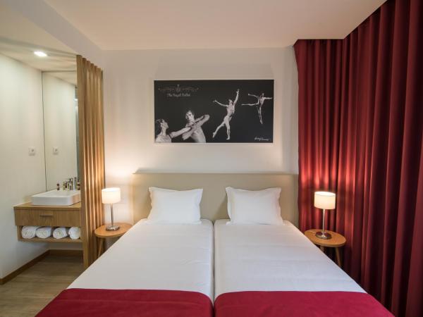 Porto Coliseum Hotel : photo 2 de la chambre chambre lits jumeaux de luxe