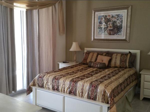 Tropic Winds Condo : photo 7 de la chambre appartement avec balcon
