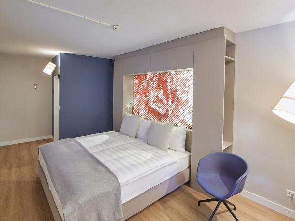 Hotel Wettstein : photo 2 de la chambre chambre double supérieure côté ville