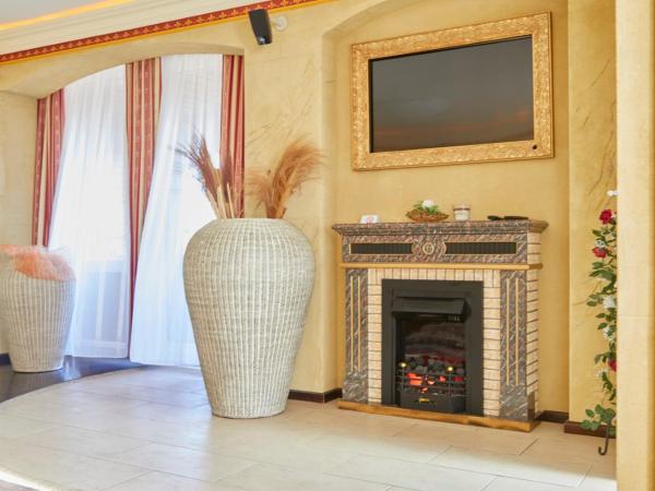 I AM HOTEL Graz-Seiersberg : photo 5 de la chambre suite avec baignoire spa et sauna