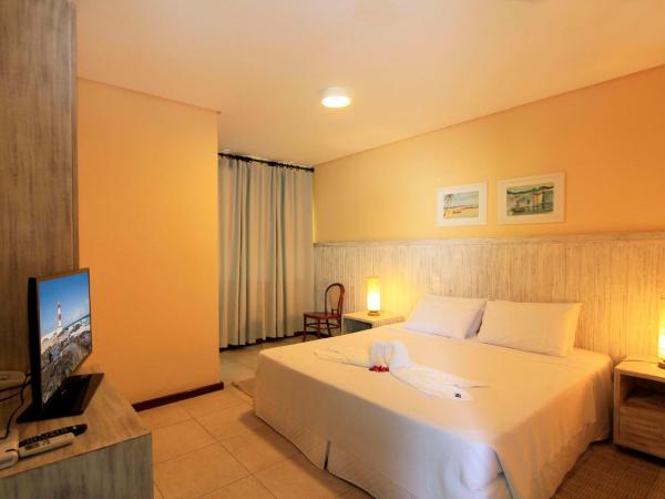 Farol de Itapuã Praia Hotel : photo 2 de la chambre chambre quadruple supérieure 