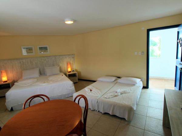 Farol de Itapuã Praia Hotel : photo 2 de la chambre chambre quadruple supérieure de luxe 